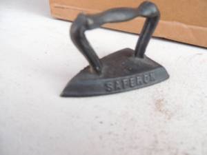 lot 81 image: Cast iron marked Massingill Saferon 3x2x2