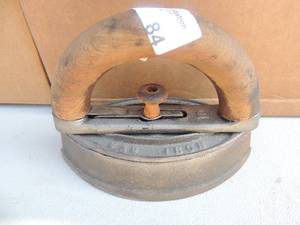 lot 84 image: Cast Iron with removable handle marked Mrs. Potts sad iron