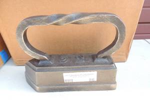 lot 86 image: Cast Iron with handle marked C12 8x3x6