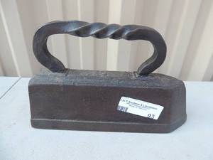 lot 93 image: Solid cast iron marked#18 10x2x6