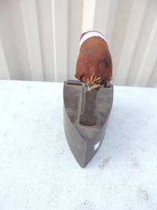 lot 111 image: Cast iron with handle leather band around handle 6x4x6