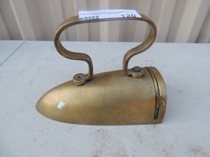 lot 120 image: Gold metal iron with handle no markings  7x4x6