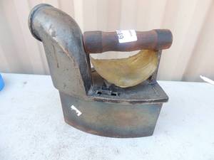 lot 149 image: German made cast iron with  handle marked 6  12 on back 6x4x8