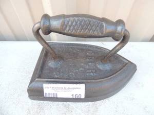 lot 160 image: Cast iron with handle marked OBER illegible other markings 8x5x6