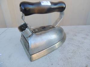 lot 190 image: Cast iron with handle has gassteam canister marked dover no burn out volts 110 watts 575 6 pounds pat#1919-29-23 dover ohio 7x4x5