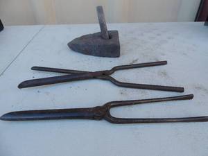 lot 198 image: Cast iron no handle no markings 5x3x1 comes with 2 curling irons  11in length