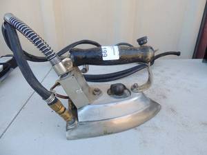 lot 199 image: Cast iron with handle and gas power cord marked the reimers clearbrook VA. Pat#3412392 120 volts 700 watts 7x4x5
