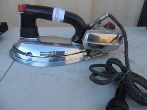 lot 210 image: Cast iron with handels has outlet cord and gassteam canister general Mills 12x4x5