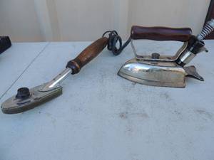 lot 214 image: metal iron with handle marked little sunbeam chicago flexible shaft co. chicago ill. USA 110 volt 3 amp. 6x3x5 plus hand held iron with outlet cord marked selector model # 100-D seal Inc. Shelton Conn. 110 v 110 watt 12 x2