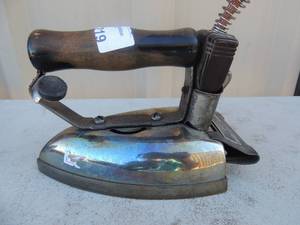 lot 219 image: Metal iron with handle and outlet cord marked general electric Hotpoint calrod 115 volt 575 watt super model B cat. No. 179 F61 6x4x5