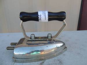 lot 226 image: metal iron D. Donaldsons safety appliances wireless iron 250 volt