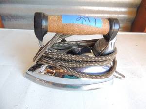 lot 249 image: Metal iron with handle and outlet cord marked proctor economy automatic no. 941 800 watts