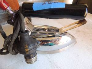 lot 260 image: metal iron with handle the victory tanst ironer type AKUD chicago electric co. 250 watts