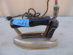 lot 271 image: Metal iron with  handle and cord Waage travel iron waage electric co. chicago  new York no.3414 350 watts