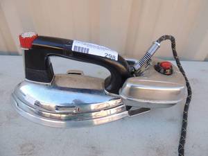 lot 298 image: Metal iron with handle and outlet cord General mills