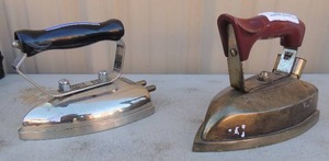 lot 305 image: Metal irons with handle x 2 Siemans schuckeftwwarke EBL-301 450 watts and D Donaldson safety heating appliances The wireless iron 5 lbs.