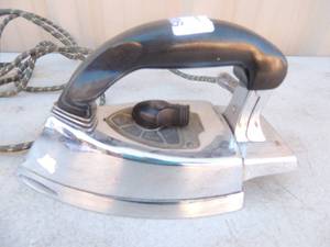 lot 306 image: Metal iron with handle and outlet cord general electric hi-speed 1000 watts