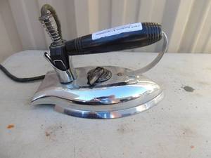 lot 340 image: Metal iron with handle and power cord The Dover co. Dependable automatic