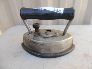 lot 344 image: Metal iron with handle and power cord Dover sad iron #162