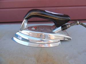 lot 357 image: Metal iron with handle and cord Wards indictur Iron Montgomery ward co.