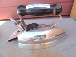lot 366 image: Metal iron with handle and cord  Coleman Master automatic