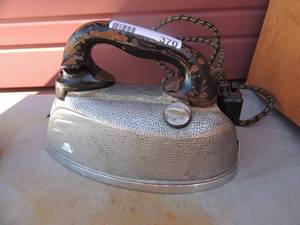 lot 370 image: Metal iron with handle and cord Steam electric corp. series  S