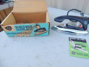 lot 378 image: Metal iron with handle and cord in box General electric world wide 405