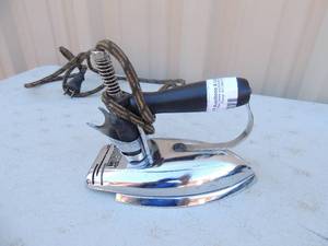 lot 400 image: Metal iron with handle and cord  Fostoria Berstead MFG. Co.