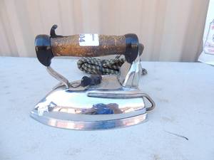 lot 404 image: Metal iron with handle  Proctor snap stand speed iron