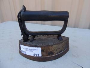 lot 411 image: Cast iron with handle marked Sensible no. 90