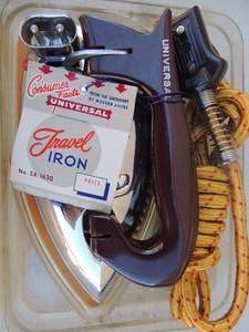lot 432 image: Universal travel iron in case