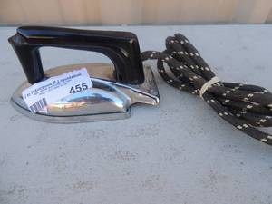 lot 455 image: Metal Iron with handle and cord Sunny Suzy Wolvenne Supply and Mfg.