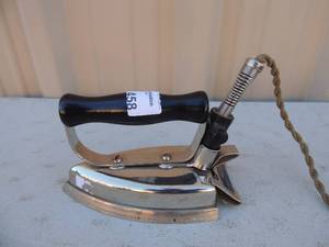 lot 458 image: Metal Iron with handle and cord  Hotpoint Calrod Edison electric appliance co.