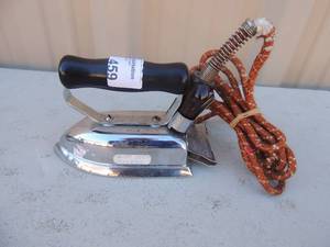 lot 459 image: Metal Iron with handle and cord electrex traveling iron USA
