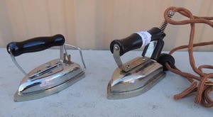 lot 463 image: Lot of 2 Metal Iron with handle and cords one says international baby iron other no markings