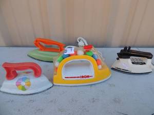 lot 469 image: Lot of 4 toy irons bubble pop style wind up 2 metal with cord