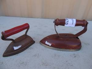 lot 470 image: lot of 2 metal irons with handles  baby Betsy ross 60 watt 5x3x3 and lady Dover  ohio 3x2x4