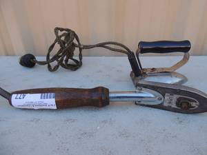 lot 477 image: lot of 2 iron with hand and cord and iron wand