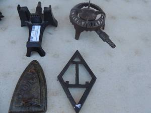 lot 488 image: Lot of 4 cast iron stands with gas outlet one cast iron hand and 1 iron bottom