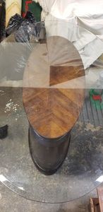 lot 1 image: Oval Wood Base (45x19x30) with Glass Top (70x45x30) Table