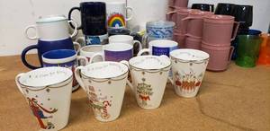lot 50 image: Set of Christmas Mugs and misc. Plastic and Ceramic Mugs