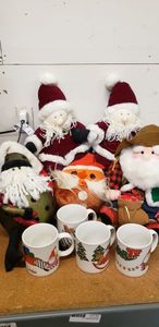 lot 52 image: Christmas Mugs and Stuffed Santas
