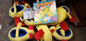 lot 152 image: Lucky Ducks Game, Several Decks of Cards with Delta Logo and Plush Airplane Baskets