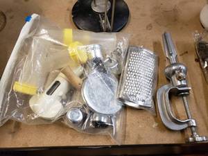 lot 105 image: Paper Towel Holder, Cheese Grater, Cork Screw Bottle Opener