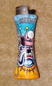 lot 131 image: ED HARDY 6 INCH JUMBO CURVE Refillable LIGHTER Bottle Opener  - RETAIL $15.95