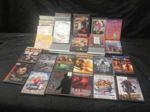 lot 150 image: RITECH DVD RJ1500DVX II DIVX CERTIFIED PLAYER WITH 25 DVDS