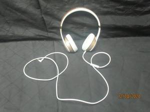 lot 169 image: PAIR OF BEATS BY DRE GOLDWHITE&nbsp PROPERLY WORN FACE COVERING REQUIRED
