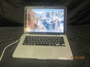 lot 187 image: WORKING MAC BOOK PRO�