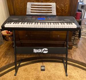 lot 26 image: Rock Jam 61 Key Keyboard and Stand RJ761BT
