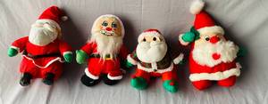 lot 50 image: 4 Small Plush Santas